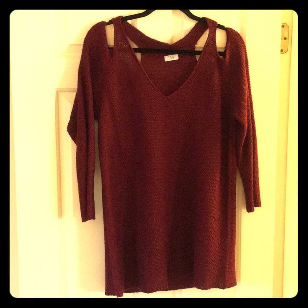 Maroon open shoulder knit sweater. Size: large